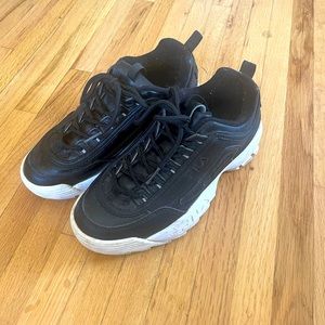 Size 6.5 Fila Sneakers. Black with white sole. Lightly worn.